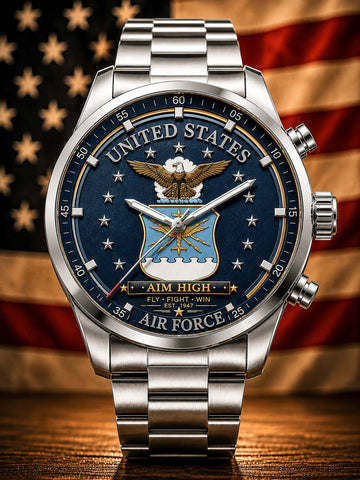 A stainless steel military-style wristwatch with a blue United States Air Force themed dial, featuring an eagle and shield emblem, set against a blurred American flag background.