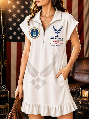 A woman models a white short-sleeve polo dress with U.S.