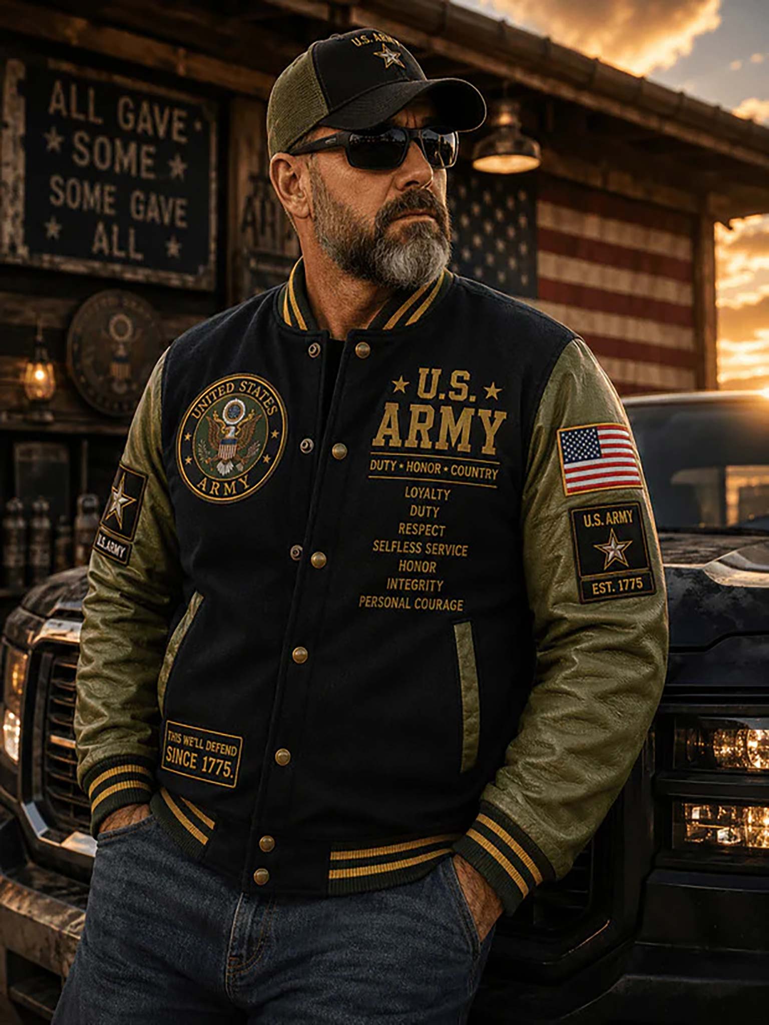 A man wearing a black and olive green varsity jacket with 'U.S.