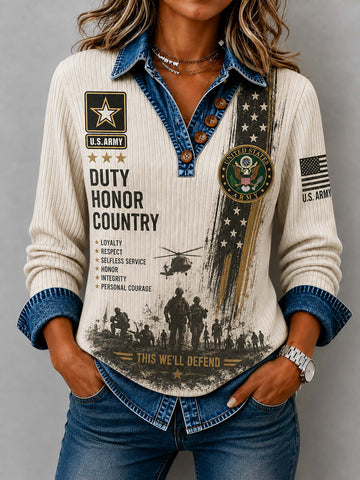 A woman wearing a long-sleeve cream ribbed shirt with a distressed U.S.