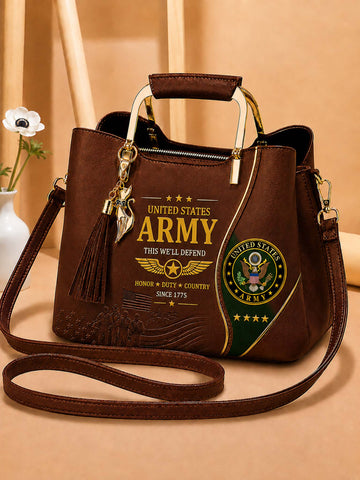 A brown faux-leather handbag with military-themed graphics, featuring 'United States Army' text, a gold eagle charm, a tassel, and a green and gold seal on the front. The bag has a top handle, a shoulder strap, and is set against a warm beige background.
