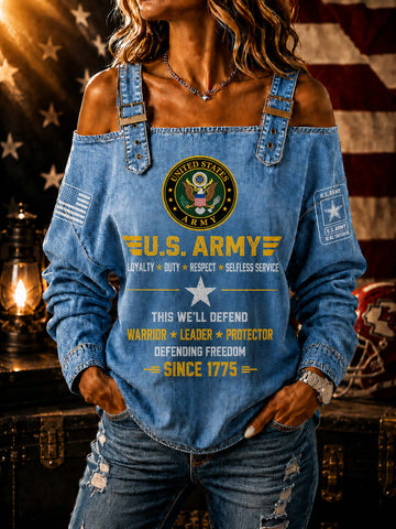 A woman wearing a blue off-the-shoulder denim top with a large U.S.