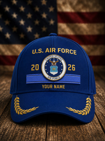 A royal blue baseball cap with gold and white embroidered details, featuring 'U.S.