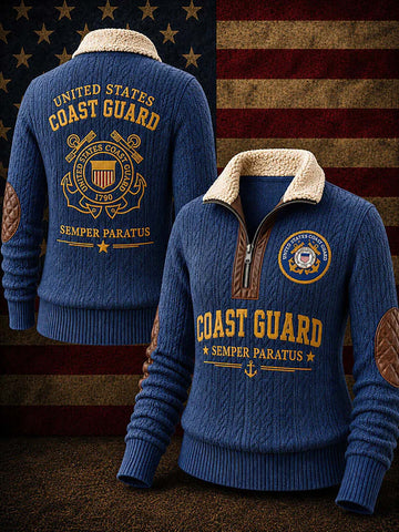 A blue cable-knit quarter-zip sweater shown from both front and back, with a cream sherpa collar, brown elbow patches, and yellow Coast Guard graphics. The background is a rustic American flag.