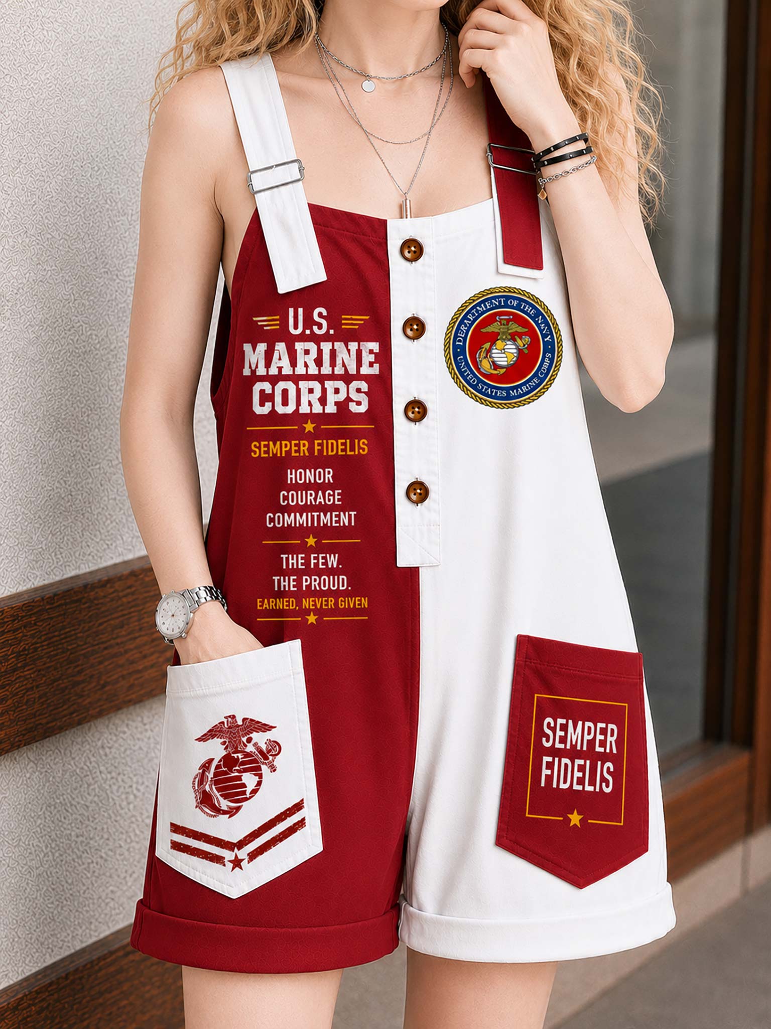 A woman wearing a sleeveless white and red overall romper with U.S.