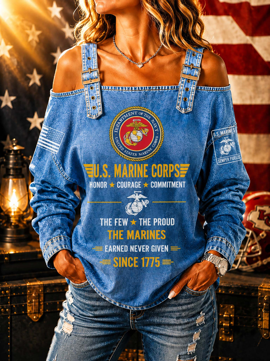 A woman wearing a blue denim off-the-shoulder top with a large U.S.