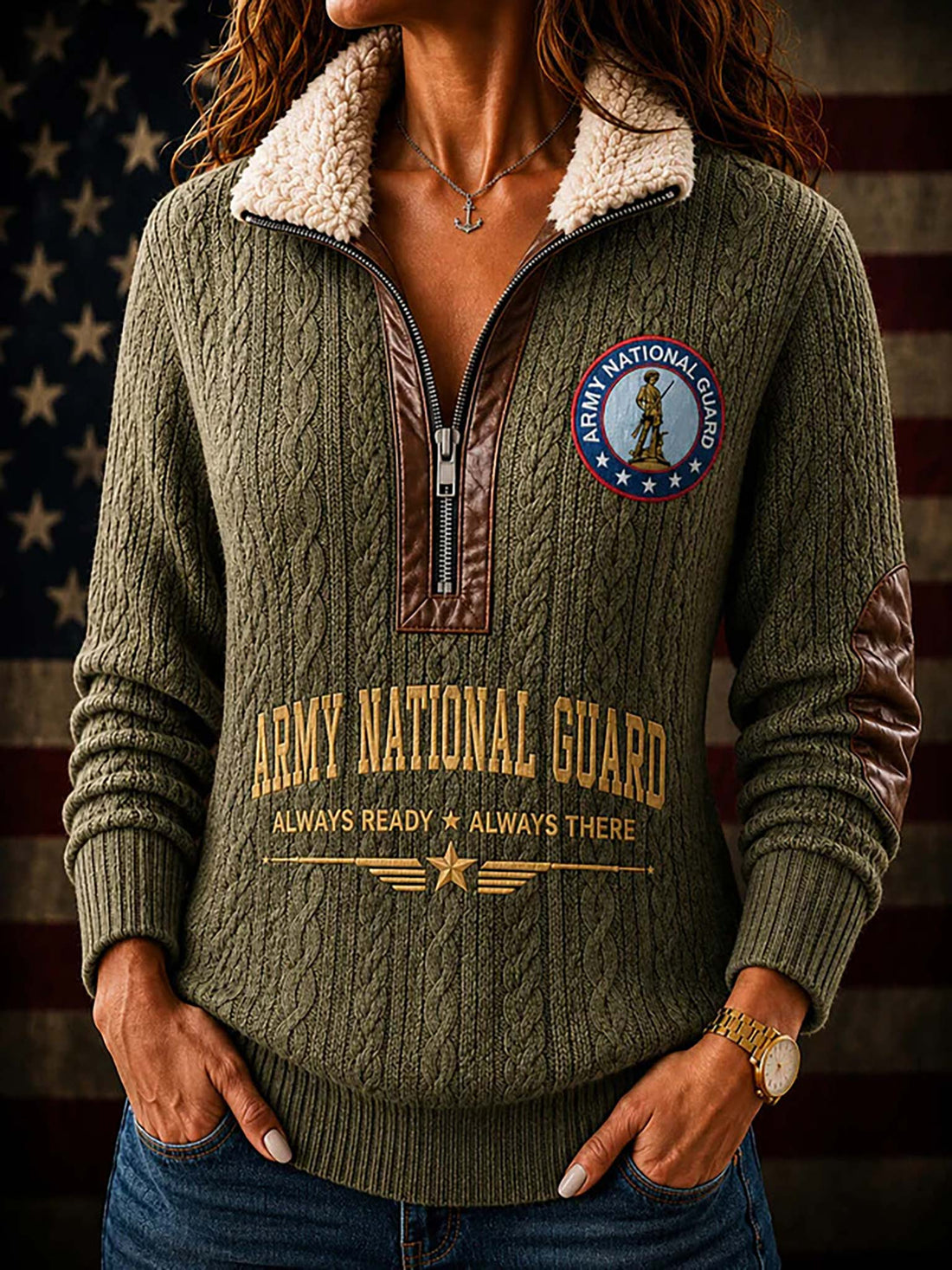 An olive green quarter-zip pullover sweater with a cream sherpa collar, featuring Army National Guard graphics on the front and back, displayed against a dark American flag background.