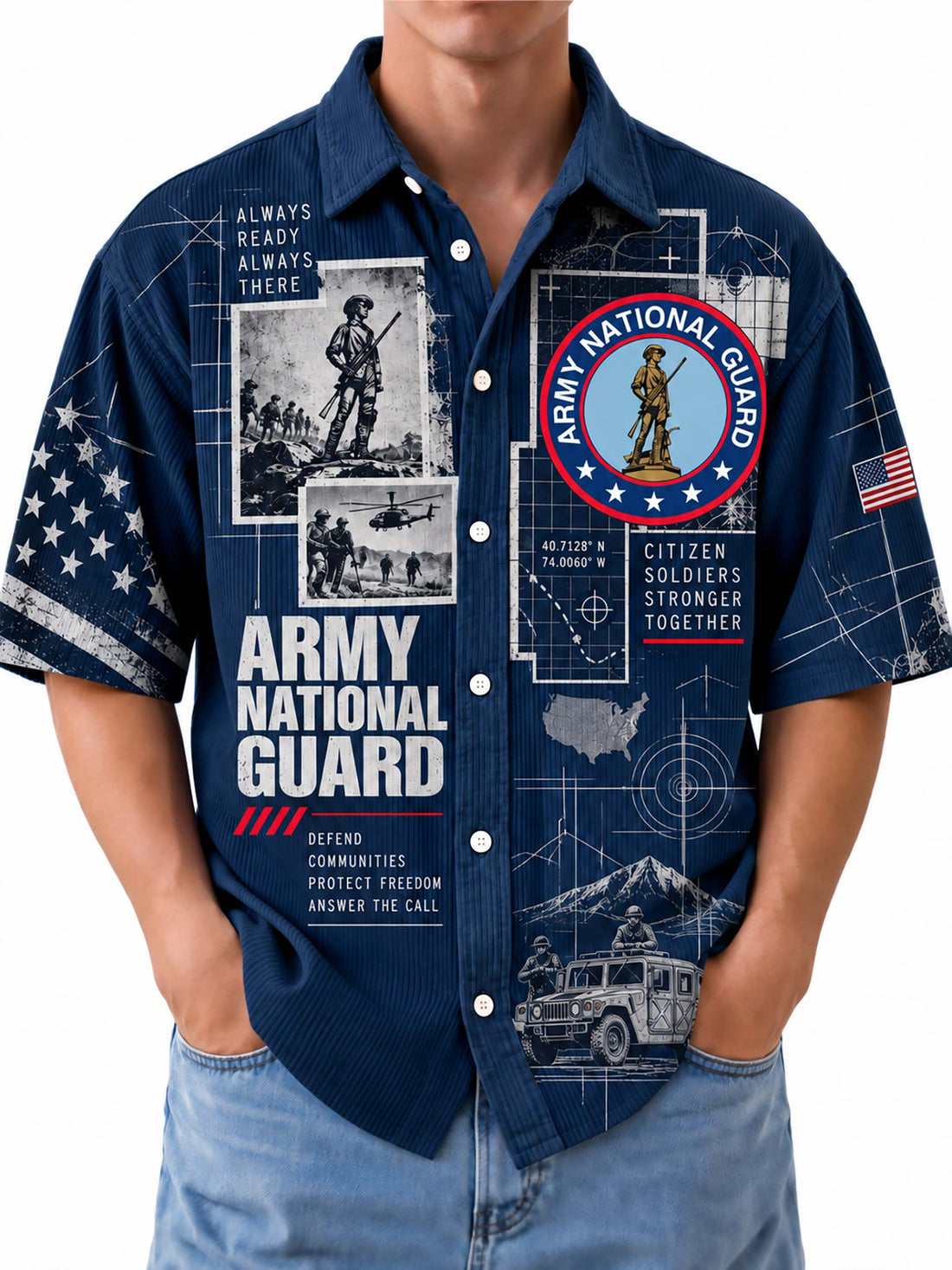 A man wearing a navy blue short-sleeve button-up shirt with a detailed Army National Guard graphic print, paired with light blue jeans.
