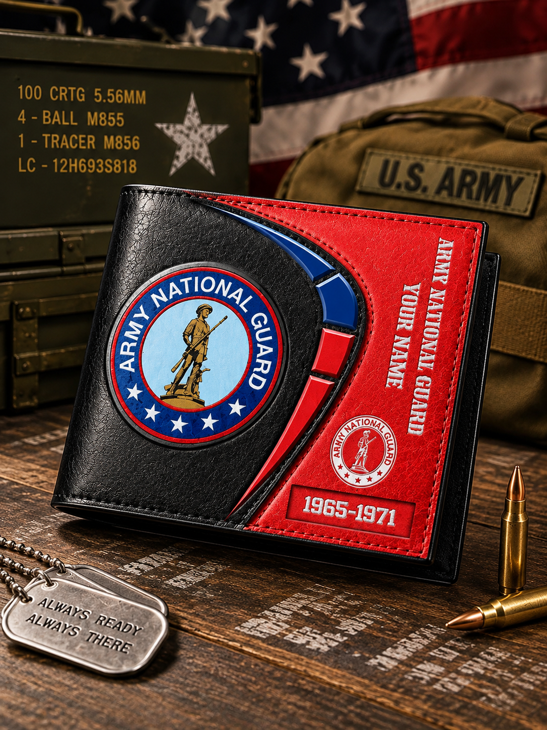 A black and red Army National Guard bi-fold wallet with a circular emblem on the front, displayed on a wooden surface with military-themed props including an American flag, a U.S.