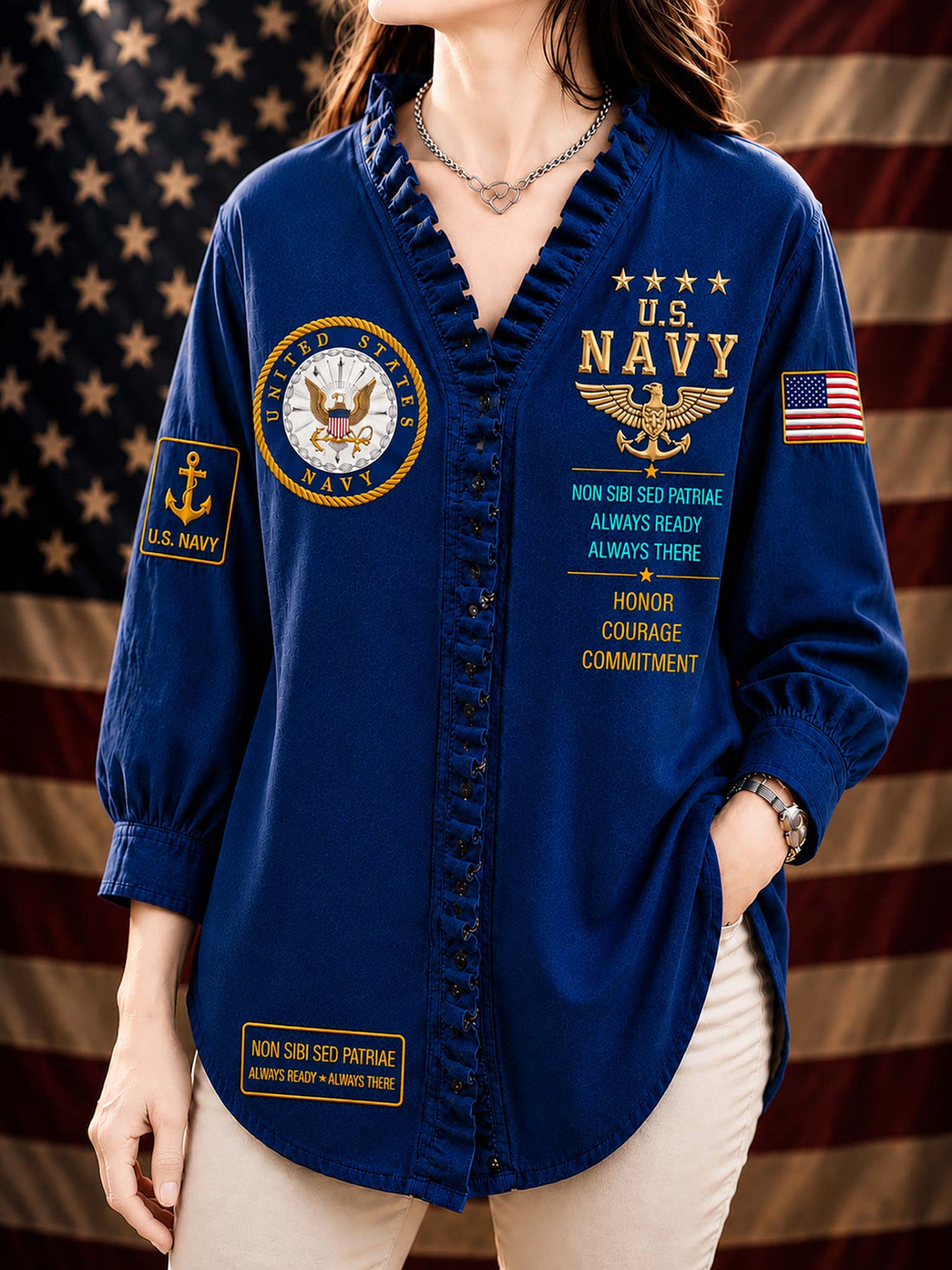 A woman wearing a black long-sleeve button-front shirt with U.S.