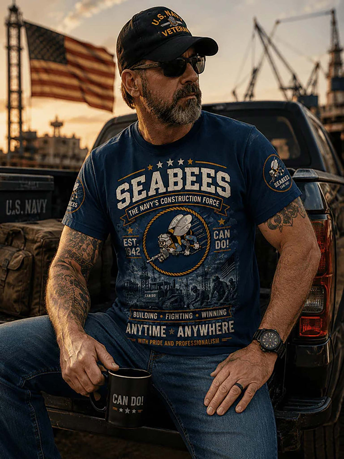 Blue t-shirt with Seabees design and text on a wooden background