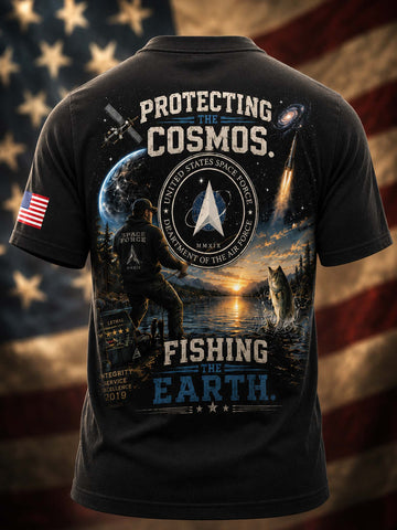 A black short-sleeve t-shirt shown from the back, featuring a large patriotic graphic with the text 'PROTECTING THE COSMOS' and 'FISHING THE EARTH,' a space-and-lake scene, a fisherman silhouette, and a U.S.