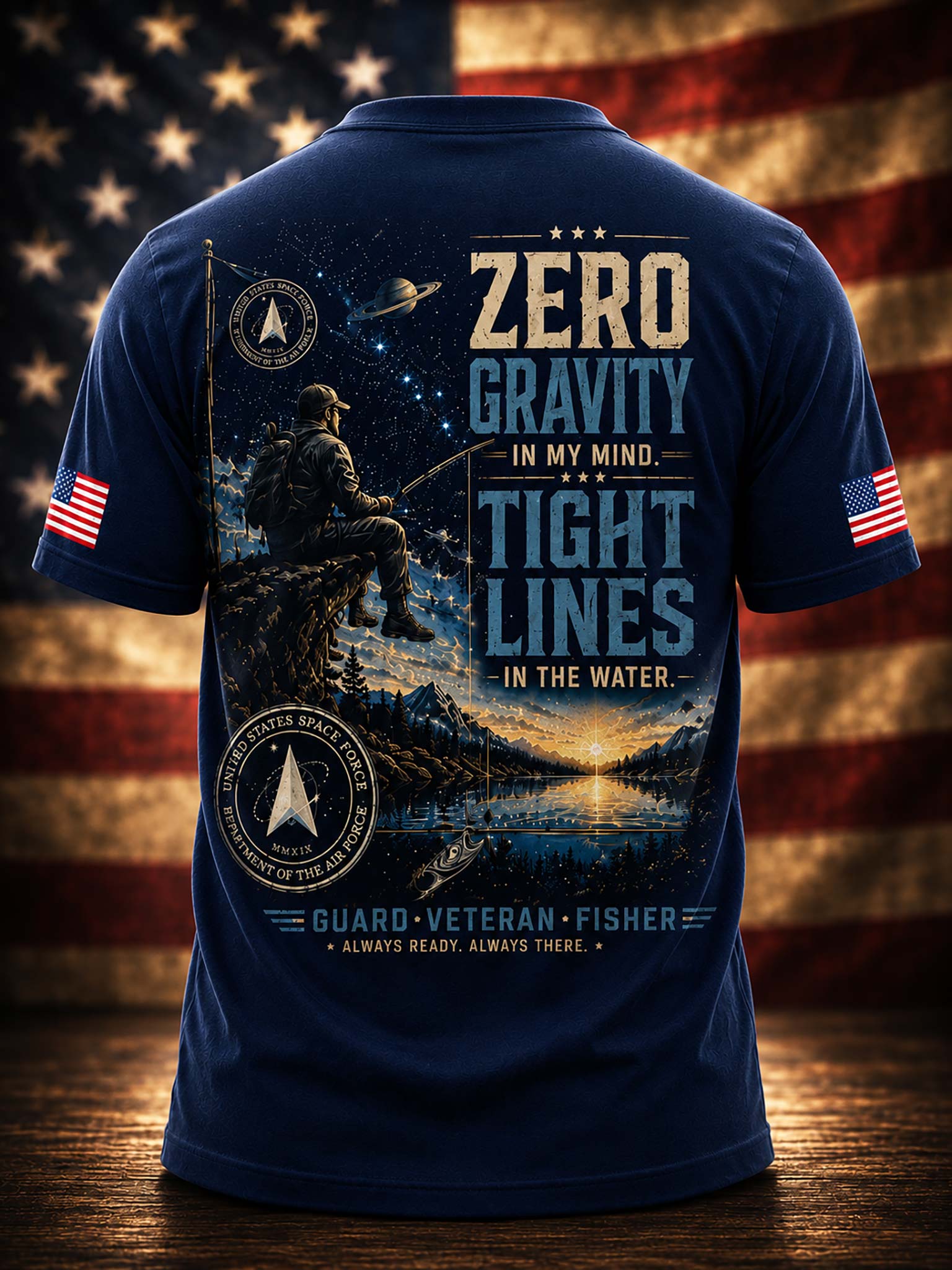 A navy short-sleeve t-shirt shown from the back, featuring a large patriotic military-themed graphic with a fisherman silhouette, stars, mountains, and text reading 'ZERO GRAVITY IN MY MIND. TIGHT LINES IN THE WATER.