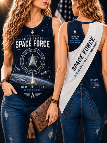 Two women modeling a sleeveless dark navy space-themed tank top with a large 'United States Space Force' graphic and a white sash that reads 'Space Force.' One shows the front and the other shows the back, photographed against a dark patriotic background with an American flag.