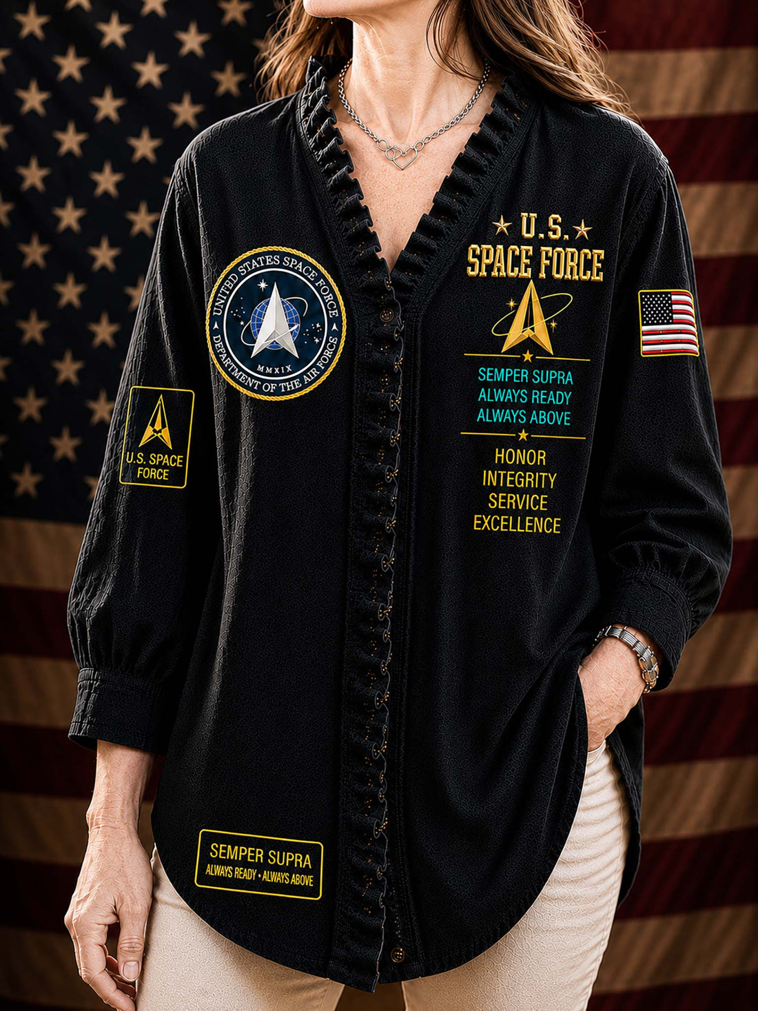 A woman wearing a black long-sleeve button-front shirt with U.S.