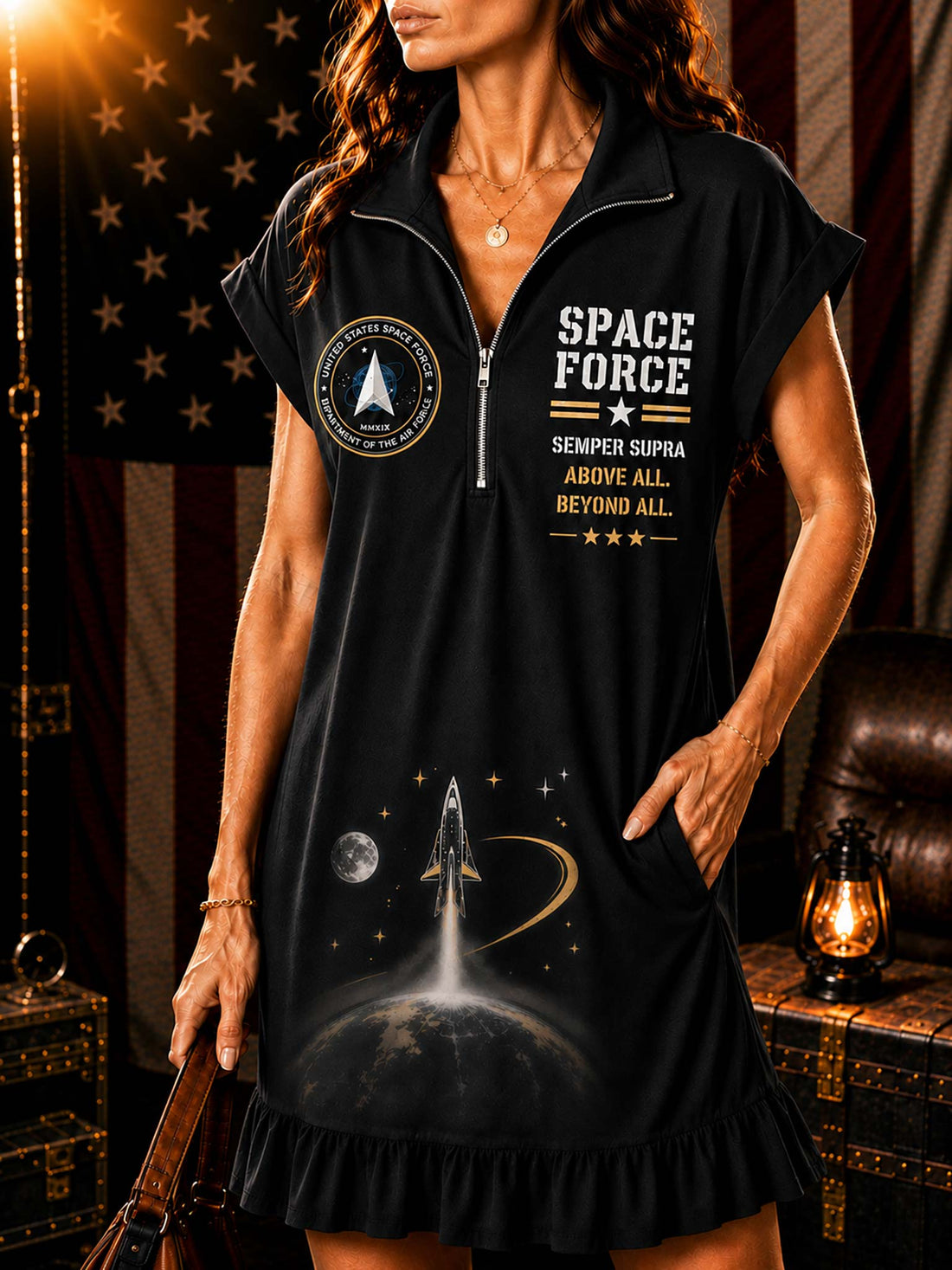 A woman models a white short-sleeve collared dress with a front zipper, featuring 'SPACE FORCE' text, a circular emblem, and a faint rocket graphic on the front, set against a rustic American flag and vintage background.