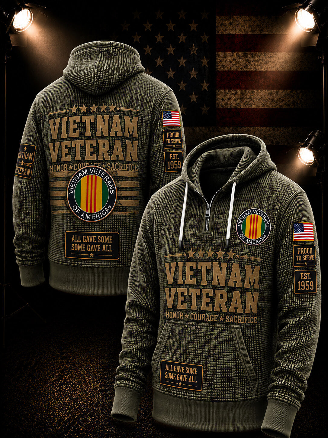 Two olive green quarter-zip hoodies shown from front and back, both printed with large 'VIETNAM VETERAN' text, a circular Vietnam Veterans emblem with red, yellow, green, and white stripes, an American flag patch, and a small 'EST 1955' patch. The back view is on the left and the front view is on the right, set against a dark patriotic background with spotlight effects and an American flag.