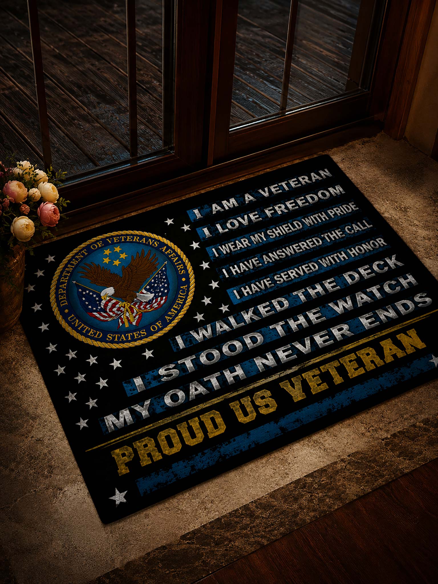 A rectangular patriotic doormat with a dark navy background, featuring the US Army Special Forces emblem on the left and white and gold text celebrating a veteran, placed in front of glass doors in a home entryway.
