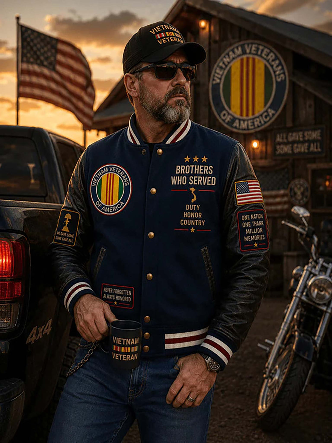 A navy blue and black varsity-style jacket shown from front and back, with large Vietnam Veterans of America emblems, gold buttons, American flag patches, and patriotic text. The background is a dark patriotic scene with an American flag and silhouettes.