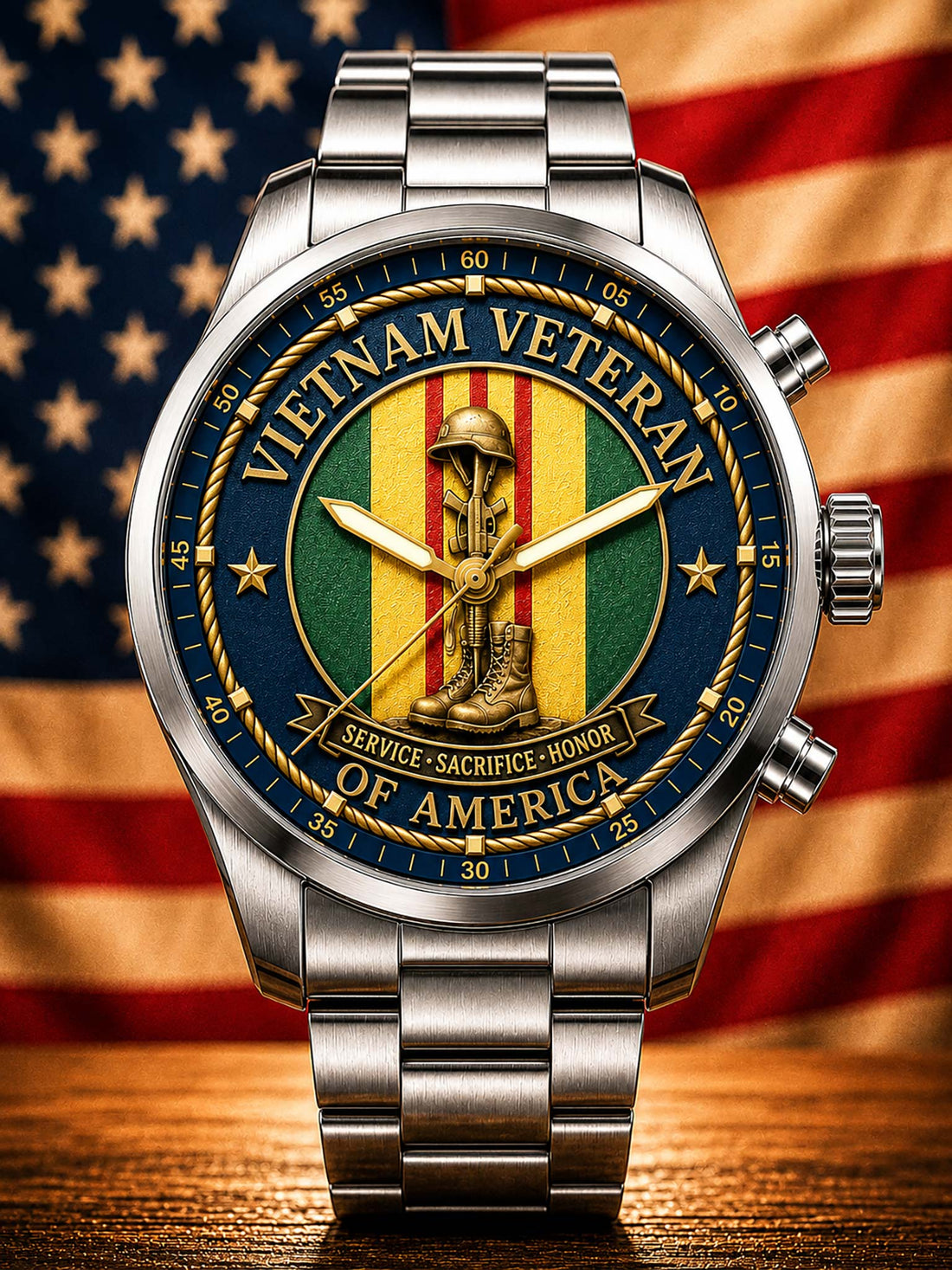 A stainless steel wristwatch with a large round dial featuring a Vietnam Veteran emblem, set against a blurred American flag background on a wooden surface.