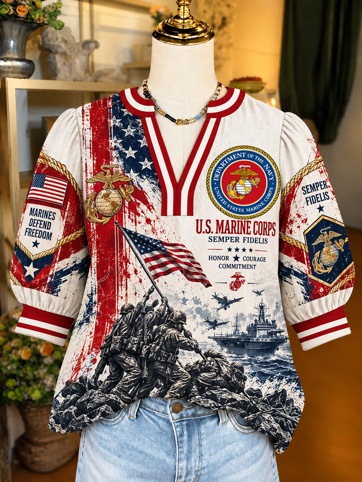 A short-sleeve graphic T-shirt displayed on a mannequin torso, featuring U.S.