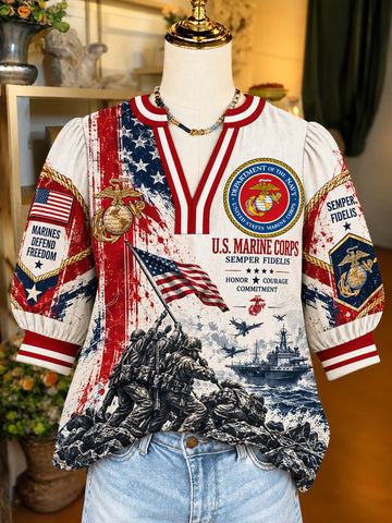 A short-sleeve graphic T-shirt displayed on a mannequin torso, featuring U.S.