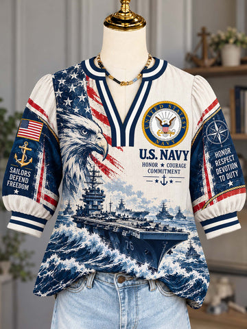 A short-sleeve V-neck top displayed on a mannequin torso, featuring a U.S.