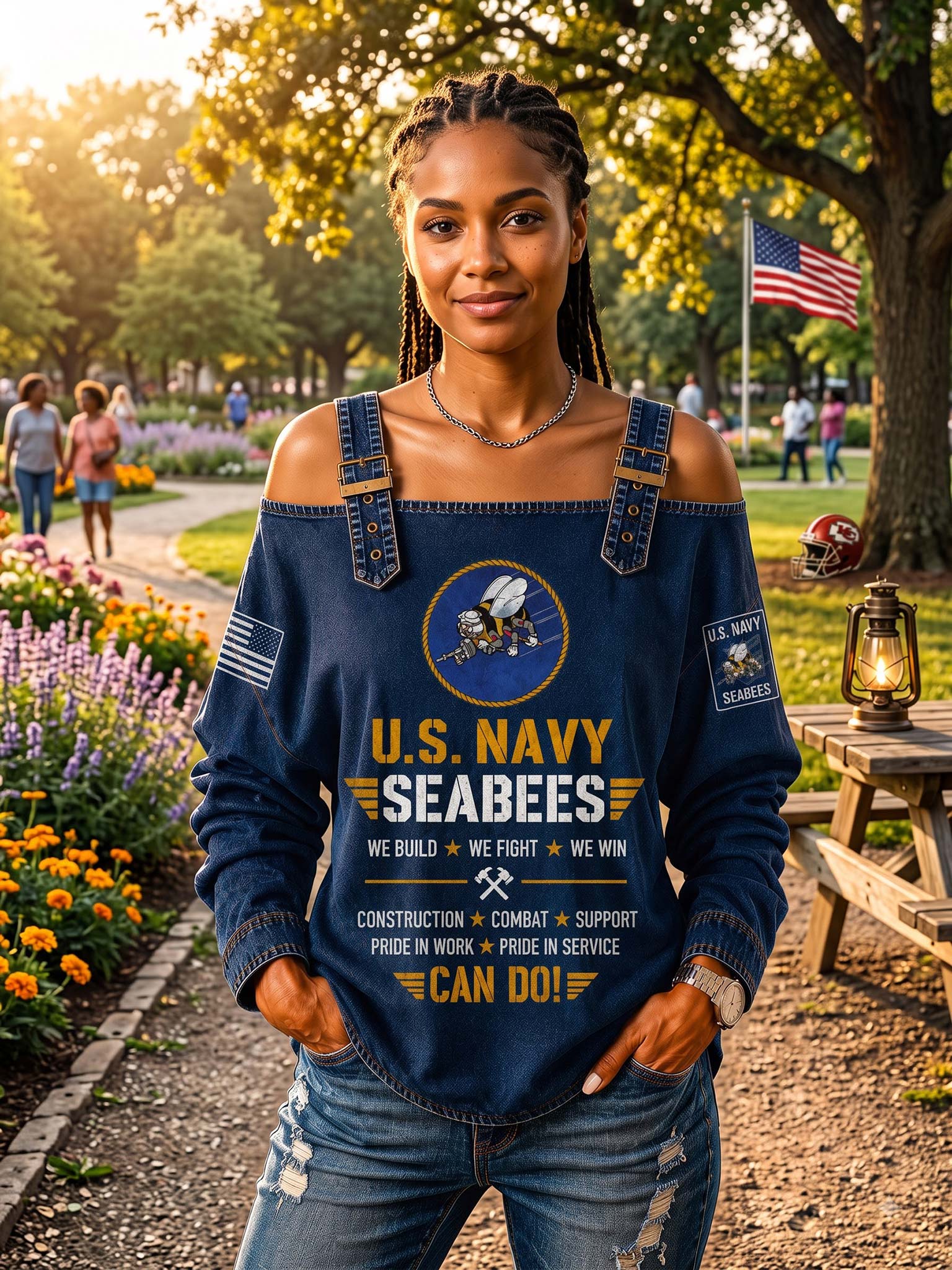 A woman stands outdoors in a park-like setting wearing a navy blue U.S.